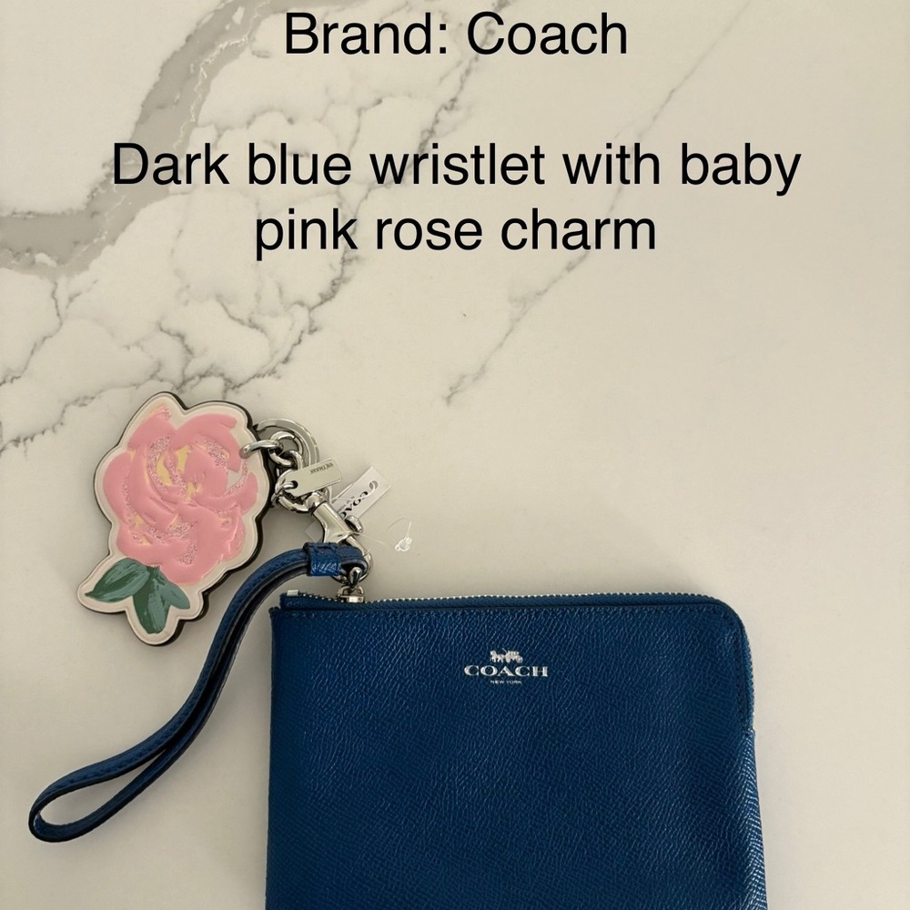 Coach Dark Blue Wristlet with Pink Rose Charm